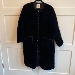 Annie Bing black velvet puff king snap from coat.